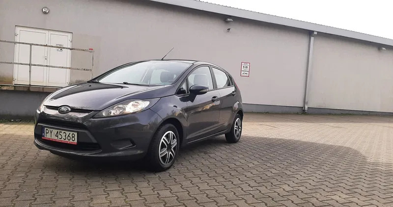 samochody osobowe Ford Fiesta cena 13000 przebieg: 163000, rok produkcji 2009 z Poznań